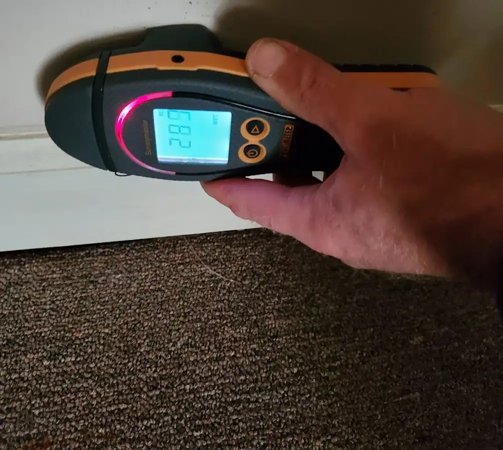 Moisture detection at baseboard during Burst Pipe Cleanup in Andover